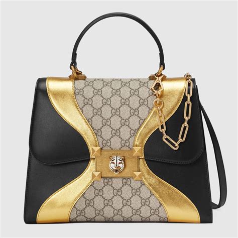 gucci black and gold bag|gucci gold handbags.